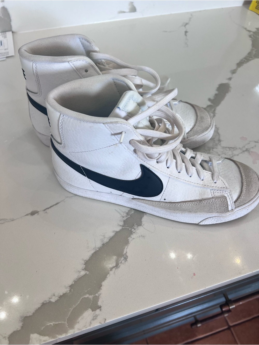 Nike Blazer White High-Top Sneakers with Black Swoosh